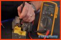 How do you test a Honeywell gas valve with a multimeter?